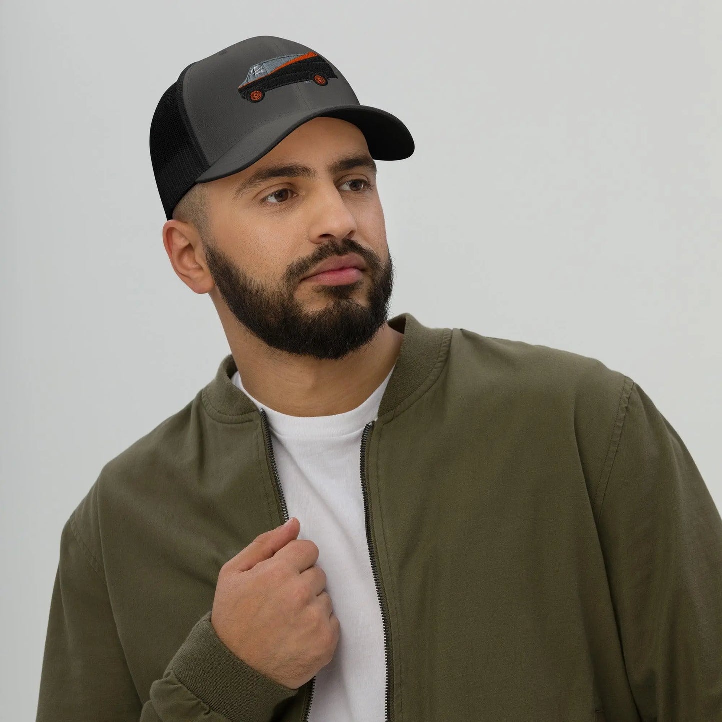 Join the A-Team: Ultimate Trucker Cap Awaits! – Hat by Yupoong Tags: 80s, graphic hat, hat, iconic, mesh back, nostalgia, plastic adjustable closure, six panel cap, trucker cap, tv, unisex, van RetroSplendor Apparel